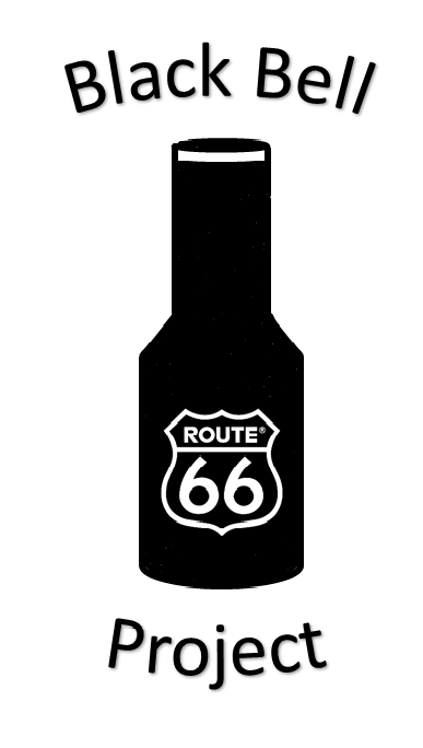Black bottle opener with a white Route 66 emblem.