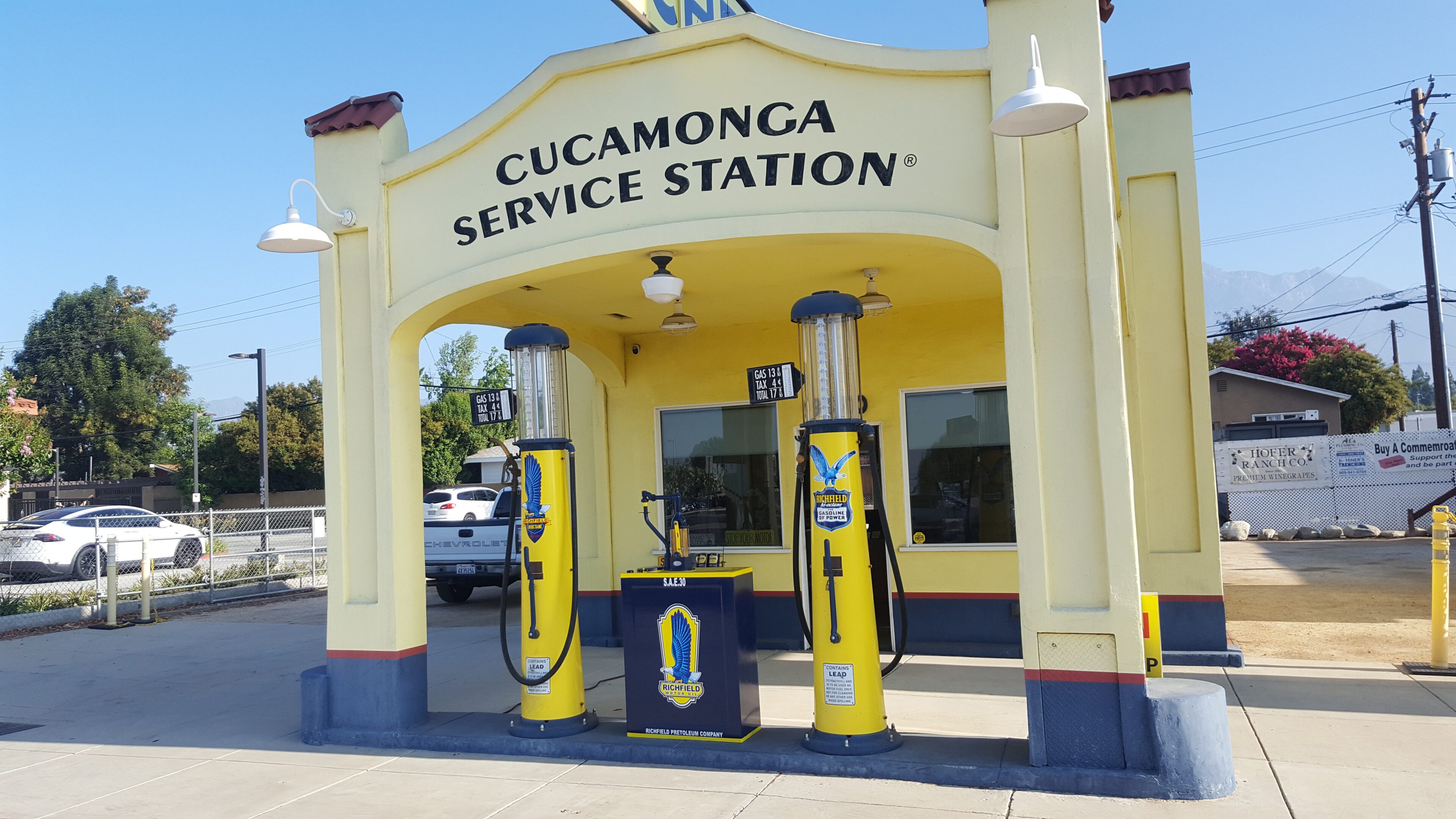 Vintage Cucamonga service station with classic gas pumps.